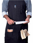 Imperméable concevez l'usage en fonction du client de travail de restaurant faisant cuire des tabliers avec des poches
