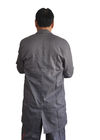 Long manteau de laboratoire de bleu marine de confort de retour exhalé pour la construction ou le travail d'entrepôt